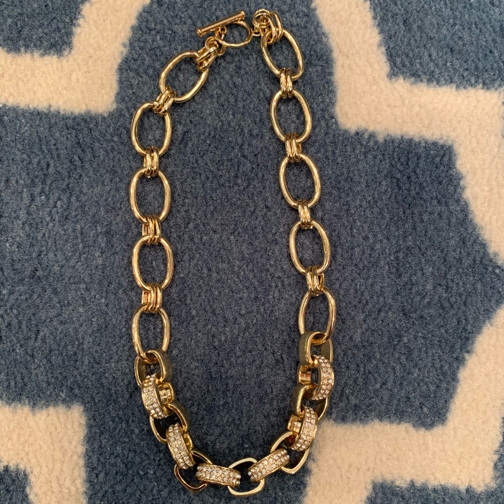 Gold tone chain necklace.